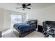 Bedroom with door to a balcony at 6804 Surf Green Ct, North Las Vegas, NV 89086