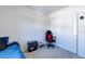 Bedroom with carpet flooring, a window with curtains, and a closet at 6804 Surf Green Ct, North Las Vegas, NV 89086