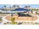 This playground area has a shade structure over modern climbing equipment at 6804 Surf Green Ct, North Las Vegas, NV 89086