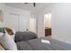 Bright bedroom featuring two beds, ensuite bathroom, and a view into the closet at 794 Willits St, Las Vegas, NV 89138