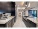 Modern, open kitchen with stainless appliances, wine cooler, and lots of counter space at 794 Willits St, Las Vegas, NV 89138