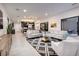 Spacious living room featuring contemporary decor, recessed lighting, and an open floor plan at 794 Willits St, Las Vegas, NV 89138