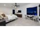 Relaxing main bedroom boasting modern furniture, a seating area, and views of the city at 794 Willits St, Las Vegas, NV 89138