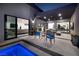 Outdoor patio featuring a pool, lounge chairs, and connected indoor living at 794 Willits St, Las Vegas, NV 89138
