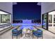 Private outdoor space features a pool, water feature, and lounge seating at 794 Willits St, Las Vegas, NV 89138