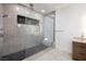 Contemporary walk-in shower with floor-to-ceiling tile work and built-in bench at 794 Willits St, Las Vegas, NV 89138