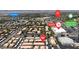 Overhead view of a residential area with nearby amenities like a shopping center and a golf course, with mountains in the background at 8410 Eldora Ave # 2045, Las Vegas, NV 89117