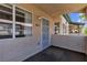 A view of the entryway with a security door and windows providing natural light to the interior at 8410 Eldora Ave # 2045, Las Vegas, NV 89117