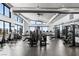 State-of-the-art fitness center with modern equipment and large windows at 12438 Heritage Bend Dr, Las Vegas, NV 89138
