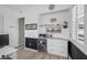 Home office with a wet bar and a mini fridge and modern cabinetry at 12438 Heritage Bend Dr, Las Vegas, NV 89138