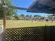 Screened-in porch provides a view of the community green space and a tennis court at 2541 Love St, Las Vegas, NV 89121