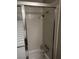 Shower stall featuring a sliding glass door and neutral white tiling at 2541 Love St, Las Vegas, NV 89121