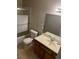 Bathroom area with a neutral color scheme, featuring a bath/shower combination at 2541 Love St, Las Vegas, NV 89121