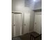 Upper hallway providing access to rooms with multiple closet doors for seamless storage at 2541 Love St, Las Vegas, NV 89121