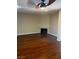 Spacious living room features gleaming hardwood floors and a cozy fireplace, perfect for relaxing at 2541 Love St, Las Vegas, NV 89121