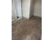 Enclosed patio features textured walls and neutral ceramic tile flooring at 2541 Love St, Las Vegas, NV 89121