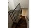 View from above the carpeted stairs with black railing, transitioning to wood flooring at 2541 Love St, Las Vegas, NV 89121