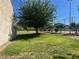 Community tennis court surrounded by green space and mature trees, promoting an active lifestyle at 2541 Love St, Las Vegas, NV 89121