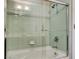 Clean bathroom with a modern tiled shower and a glass door showcasing a sleek design at 353 E Bonneville Ave # 754, Las Vegas, NV 89101