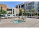 Relaxing pool area features a spa, comfortable seating, and shade structures at 353 E Bonneville Ave # 754, Las Vegas, NV 89101