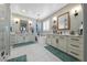 Bright bathroom boasts double sinks and a modern soaking tub at 496 Grassrange Ln, Henderson, NV 89052