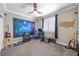 This bedroom has a ceiling fan, window with shutters, and music themed decor at 496 Grassrange Ln, Henderson, NV 89052