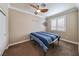 Cozy bedroom with plush carpet and plenty of natural light at 496 Grassrange Ln, Henderson, NV 89052