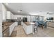 Features an open concept spacious kitchen with granite counters, stainless steel appliances, and a large island with seating at 496 Grassrange Ln, Henderson, NV 89052