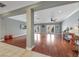 Spacious living room featuring hardwood floors, recessed lighting, and access to the outdoors at 496 Grassrange Ln, Henderson, NV 89052