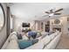 Spacious living room features a large sectional sofa and a cozy fireplace at 496 Grassrange Ln, Henderson, NV 89052