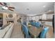 Open-concept area with fireplace, integrated living, kitchen, and dining areas, ideal for entertaining and Gathering life at 496 Grassrange Ln, Henderson, NV 89052