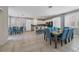 Open-concept design integrating the kitchen, dining, and living spaces, offers a seamless flow for modern living and entertaining at 496 Grassrange Ln, Henderson, NV 89052