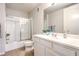Bright bathroom featuring tile flooring, a shower/tub combination and white vanity at 50 E Serene Ave # 107, Las Vegas, NV 89123