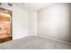 Neutral bedroom with carpet, white walls and a view to the bathroom at 50 E Serene Ave # 107, Las Vegas, NV 89123