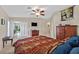 Comfortable bedroom with a vaulted ceiling, carpet flooring, and access to the Primary bath at 8208 Flowing Rapids Ct, Las Vegas, NV 89131