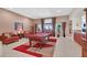 Comfortable living room featuring a pool table, neutral walls, and tasteful decor, creating a welcoming atmosphere at 8208 Flowing Rapids Ct, Las Vegas, NV 89131