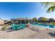 Beautiful pool and backyard with colorful Adirondack chairs, perfect for enjoying sunny days and outdoor gatherings at 8637 Home Gate Ct, Las Vegas, NV 89113