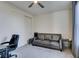 Versatile bedroom featuring a sofa, a desk and a sliding door closet at 8637 Home Gate Ct, Las Vegas, NV 89113