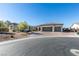 Charming single-story home featuring a three-car garage and desert landscaping at 8637 Home Gate Ct, Las Vegas, NV 89113