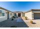 Welcoming front entrance with manicured landscaping and a paved walkway at 8637 Home Gate Ct, Las Vegas, NV 89113
