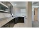 Contemporary kitchen area with a breakfast bar and ample counter space at 8637 Home Gate Ct, Las Vegas, NV 89113