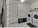 Clean laundry room with side by side washer and dryer, and access to garage at 8637 Home Gate Ct, Las Vegas, NV 89113