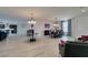 Spacious living area with elegant furnishings, dining area and hardwood floors at 8637 Home Gate Ct, Las Vegas, NV 89113
