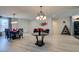 Spacious living area features a dining area and stylish seating, perfect for entertaining guests at 8637 Home Gate Ct, Las Vegas, NV 89113