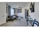 Bright living room with contemporary decor and a comfortable gray sofa at 8637 Home Gate Ct, Las Vegas, NV 89113