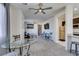 Bright, open living space features a glass table and a cozy sitting area at 8637 Home Gate Ct, Las Vegas, NV 89113