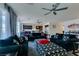 Well-lit living room with open floor plan access to the kitchen and backyard at 8637 Home Gate Ct, Las Vegas, NV 89113
