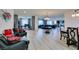 Open-concept living area with contemporary furnishings and lots of natural light at 8637 Home Gate Ct, Las Vegas, NV 89113