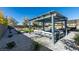 Inviting outdoor seating area with modern pergola, perfect for relaxing and entertaining friends and Gathering at 8637 Home Gate Ct, Las Vegas, NV 89113
