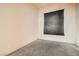 A bedroom featuring neutral carpeting and a window with horizontal blinds at 9532 Calico Garden Ave, Las Vegas, NV 89134